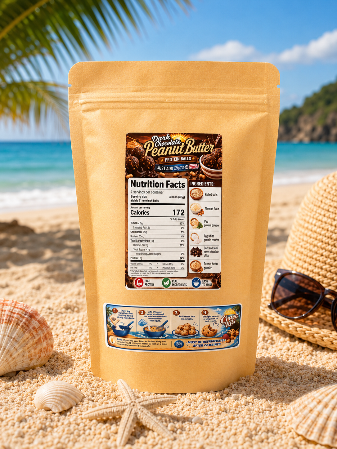Back of Crave Kits Peanut Butter Dark Chocolate Chip high-protein dessert mix bag displayed against a beach-themed backdrop with sand and ocean scenery, showcasing nutrition facts, ingredients, and preparation instructions for healthy protein ball treats.